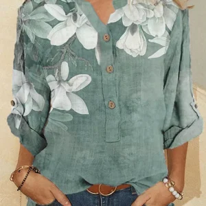 Camisa feminina de gola alta em algodão com bordados florais
