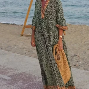 Luna · Vestido maxi de Mulher com estampado com decote em V