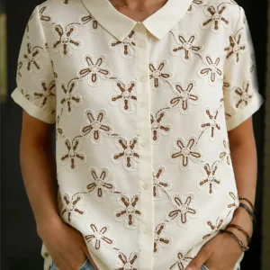 Maaike – Blusa com gola e flores para Mulher
