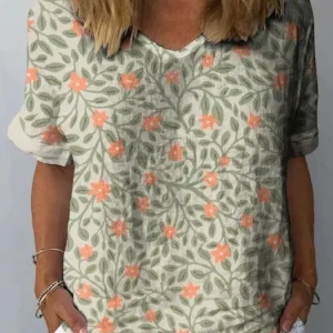 Aida - Camisa casual para mulher em algodão e linho com um bonito design floral e estampado artístico
